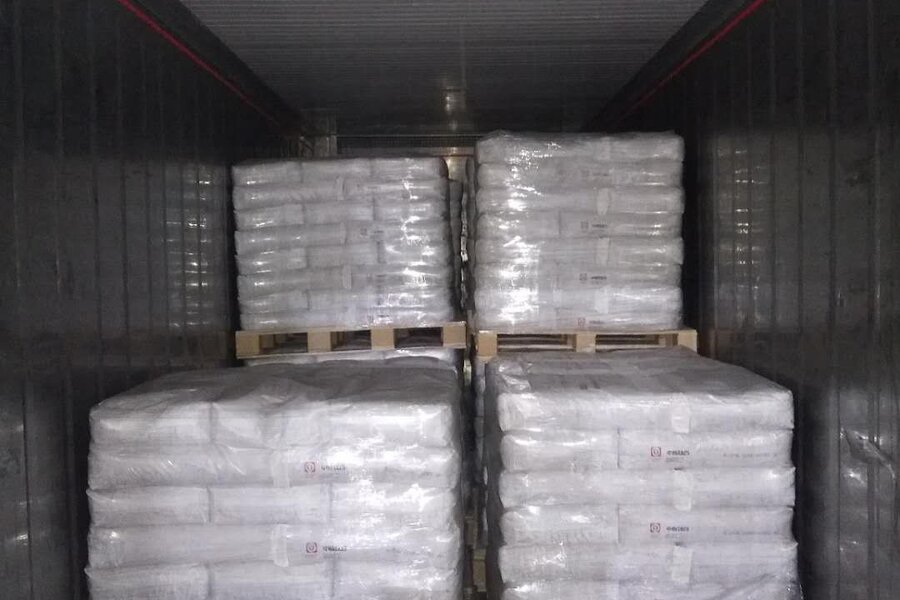 Palletised Al Burj PAC consignment loaded in a container for a Dubai sewage treatment plant