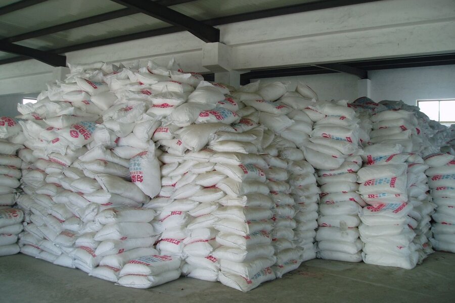 Warehouse stacked with bagged PAC awaiting distribution to East African contractors